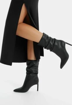 BERSHKA Slouchy - Bottines - Black