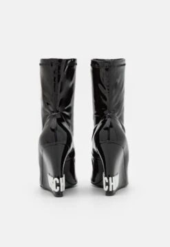 MOSCHINO Bottines Compensées - Fantasy Color -Next Soldes 4e33e4728b96415e9f521dbc3a76e905