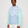 Adidas Originals Unisex - Veste Coupe-Vent - Blue Dawmbient Sky/Easy Green