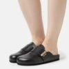 MOSCHINO Mules - Nero 2 MOSCHINO Mules - Nero -Next Soldes f19156841fdc417bad1a1bdbd4dc641c